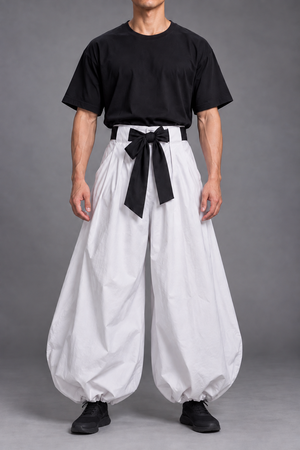 Toji cosplay costume front view – black T-shirt, waist sash and balloon white pants