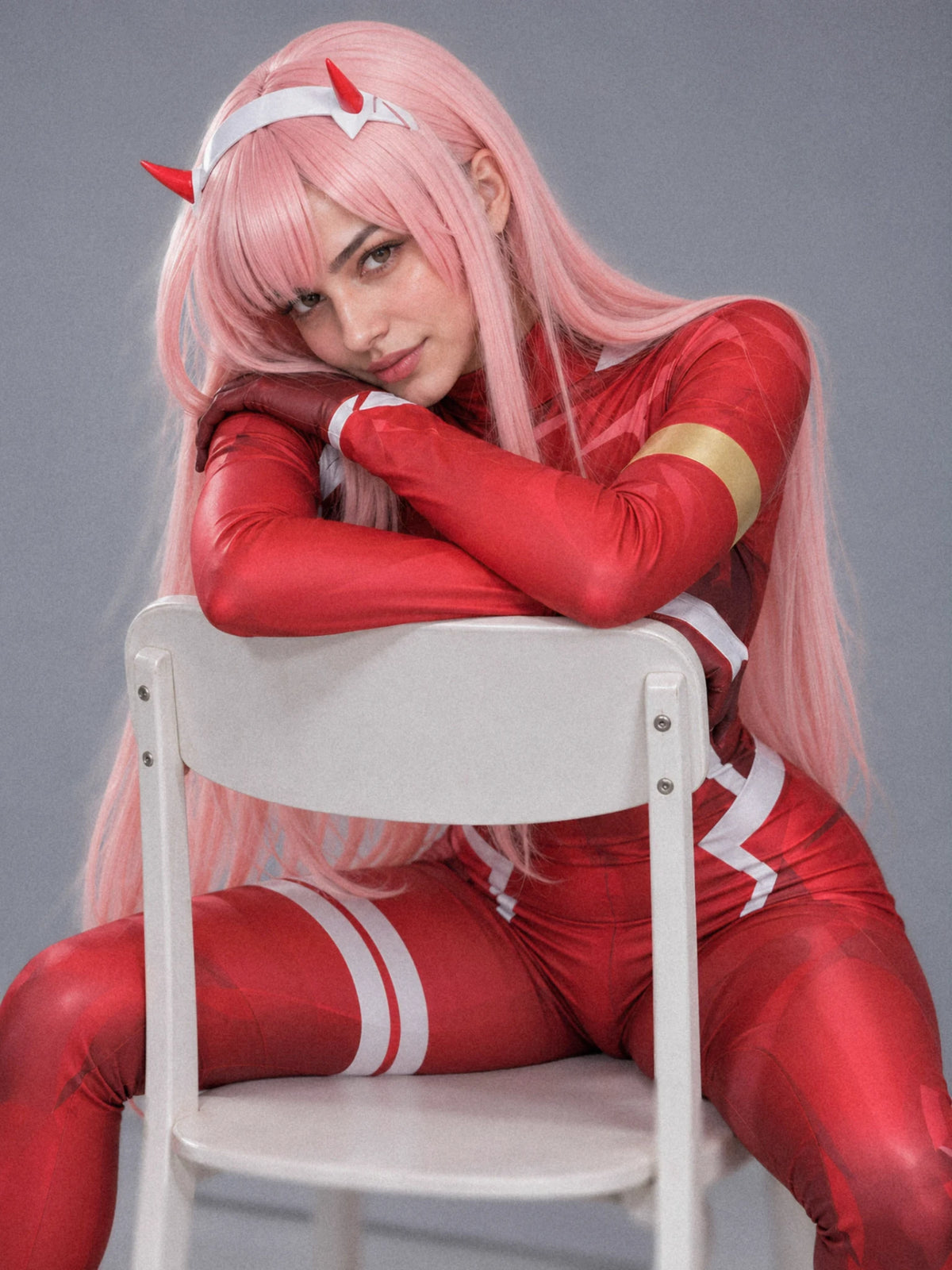 Zero Two cosplay seated portrait